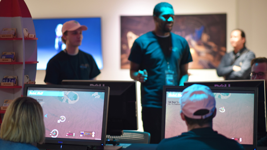Students demonstrate and play video games at the Champlain Game Studio Senior Show