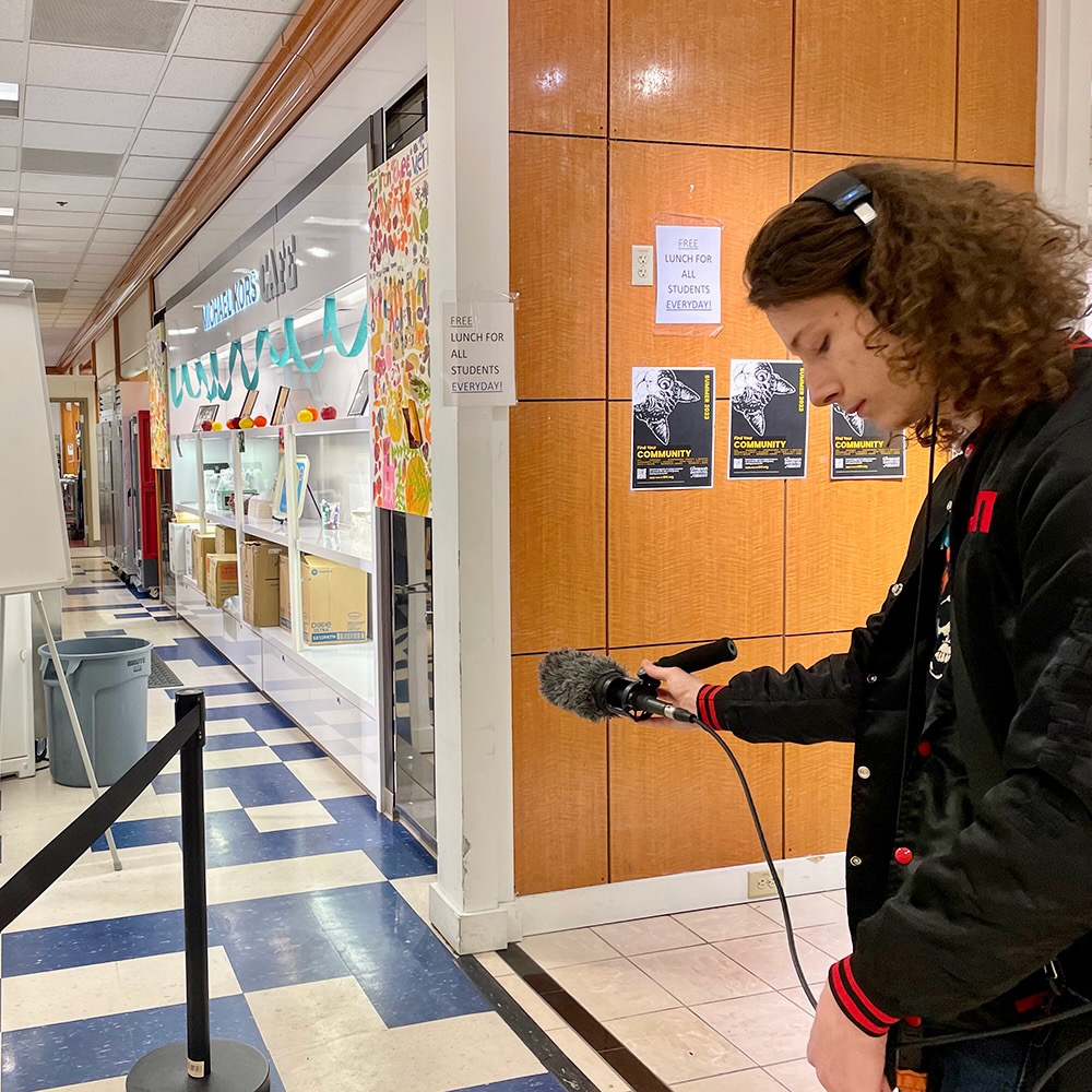 Student recording sound in the mall turned high school.