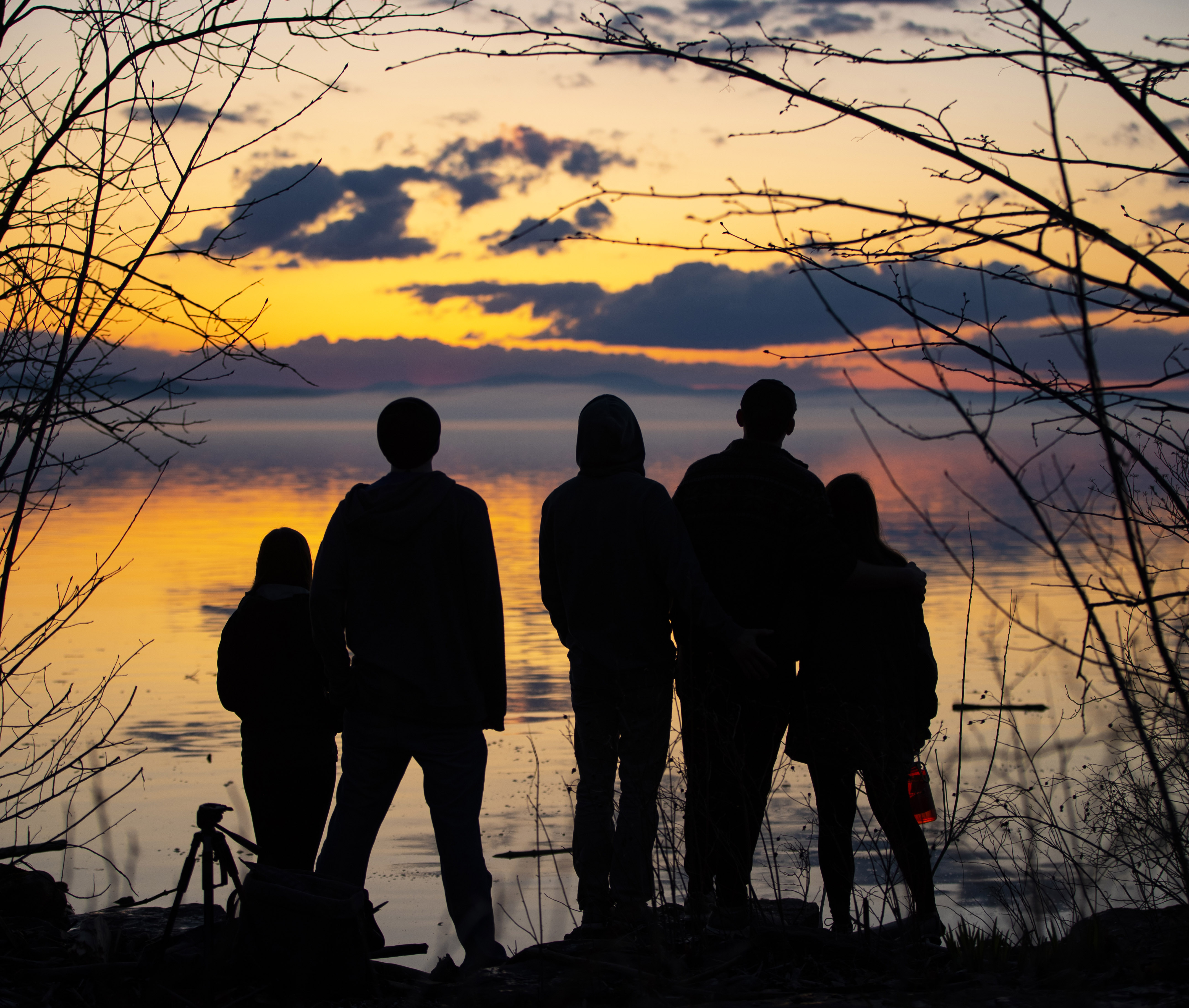 Students watching the sunset at Oakledge Park in Burlington, Vermont