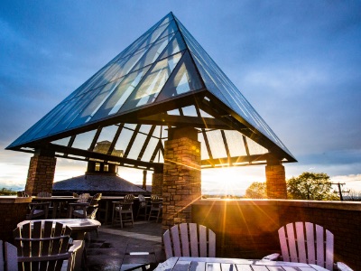The setting sun illuminates the famous glass pyramid at the Center for Communication & Creative Media at Champlain College in Burlington, Vermont.