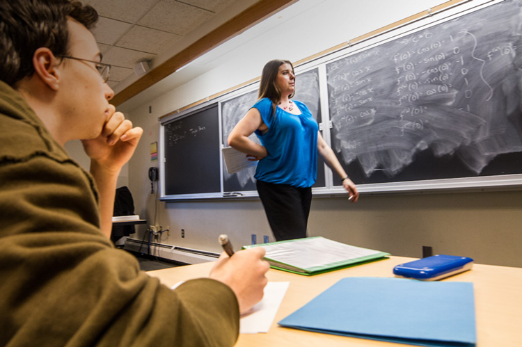 Dr. Melanie Brown, Applied Mathematics Program Director, teaches a small class