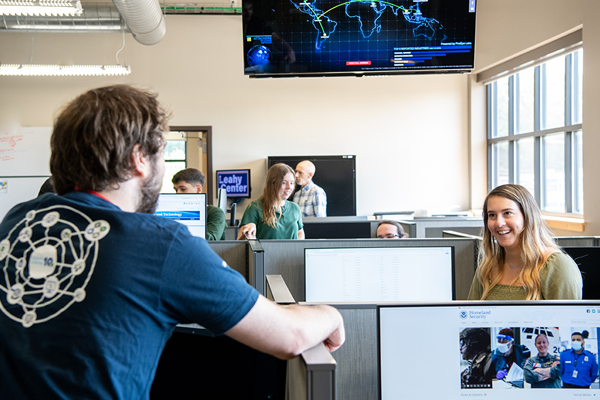 Students at work in internship positions in the Leahy Center for Digital Forensics & Cybersecurity