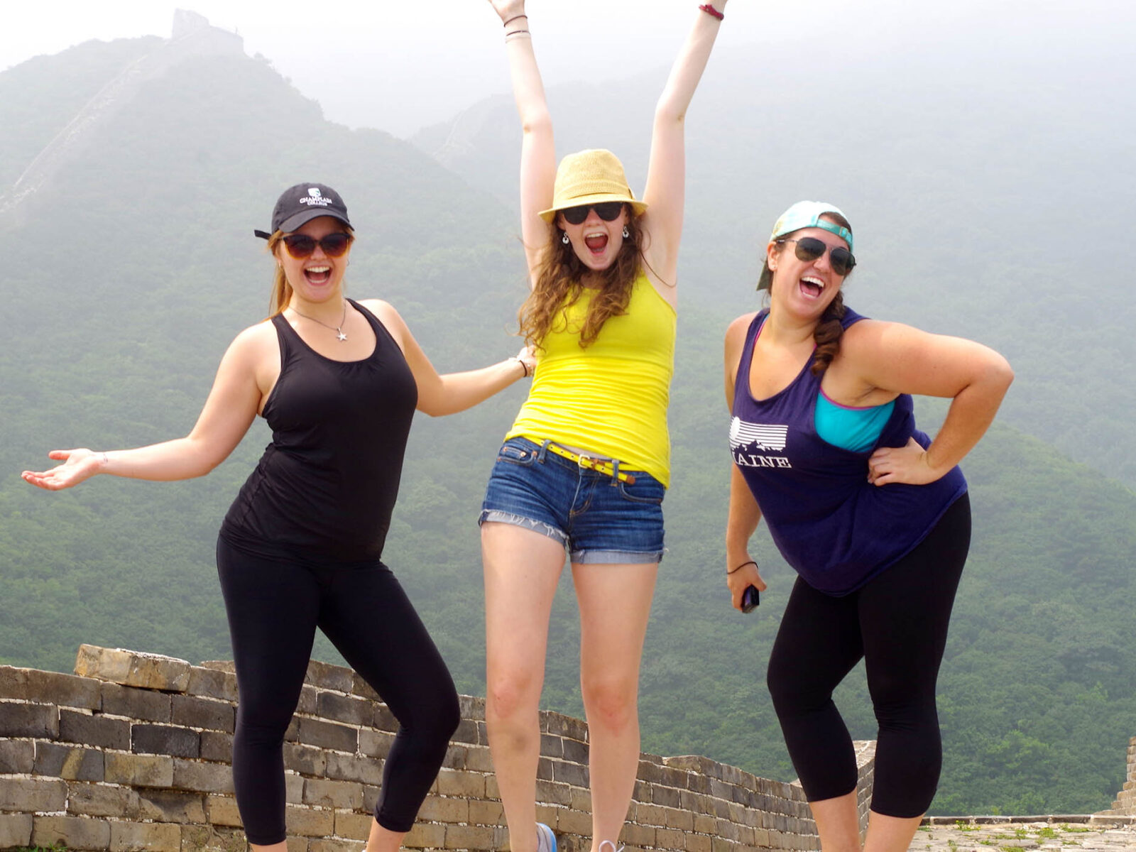 abroad students celebrate/pose for a photo on the great wall of China