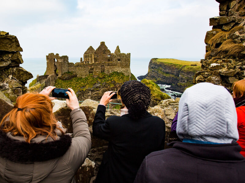 abroad students taking photos of a landmark in dublin