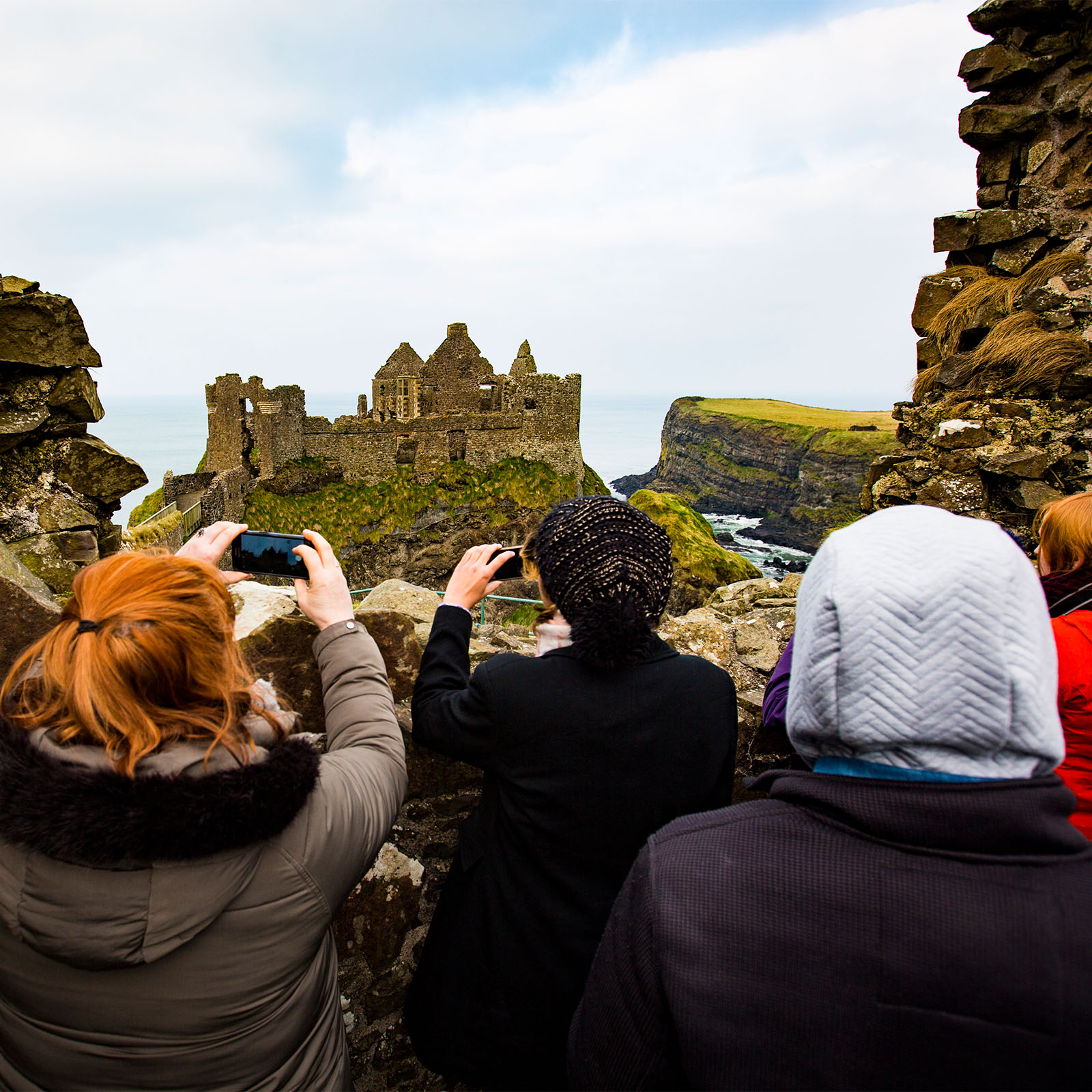 abroad students taking photos of a landmark in dublin