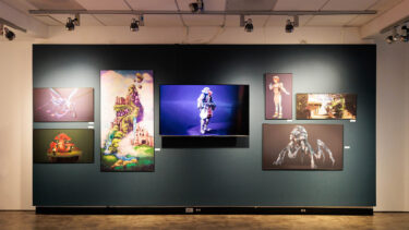 student artwork displayed on a gallery wall