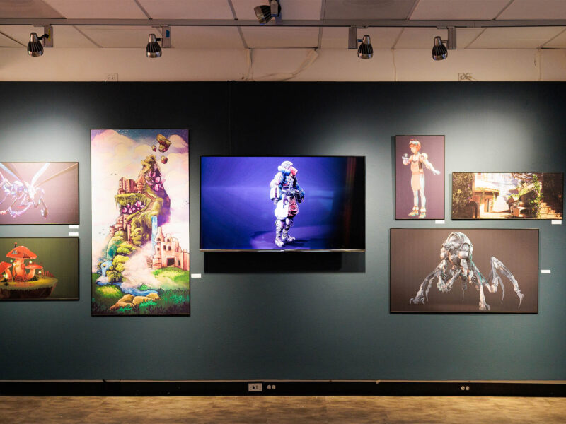 student artwork displayed on a gallery wall