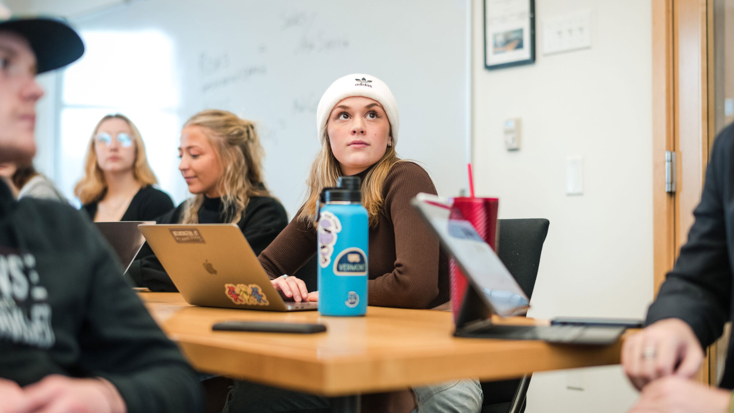 A student pays attention in a Marketing class at Champlain College.