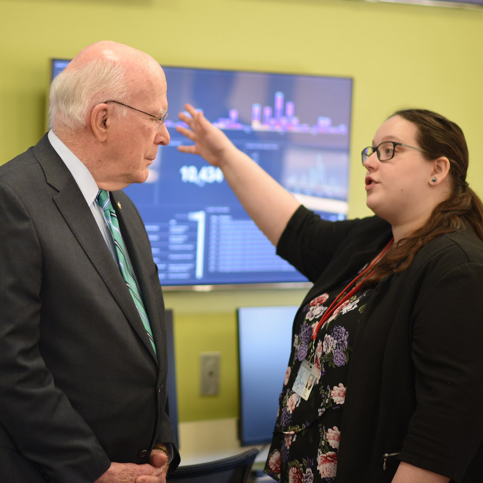 Senator Leahy speaks with a woman