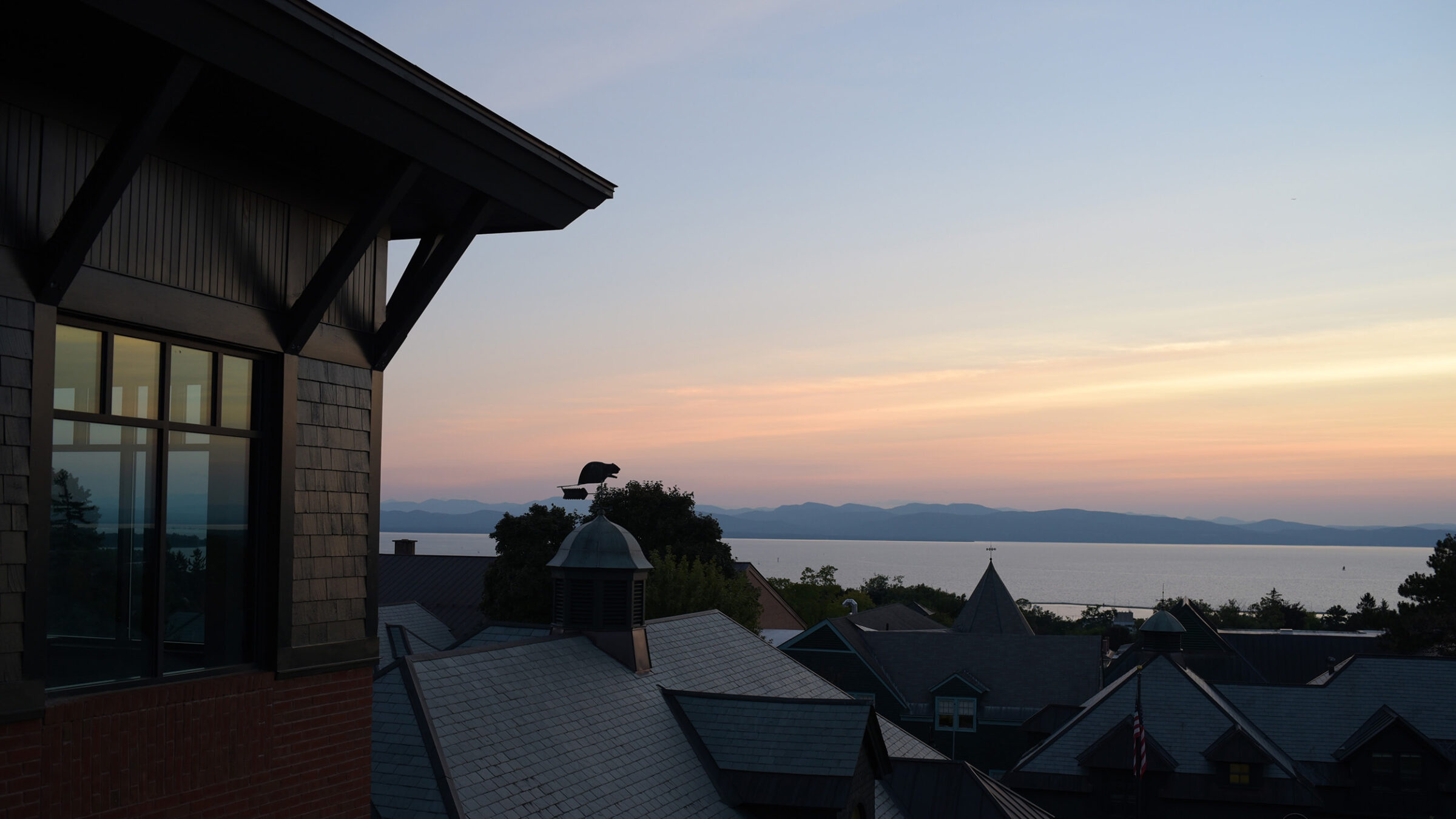 a sunset view of Lake Champlain from the terrace of the library