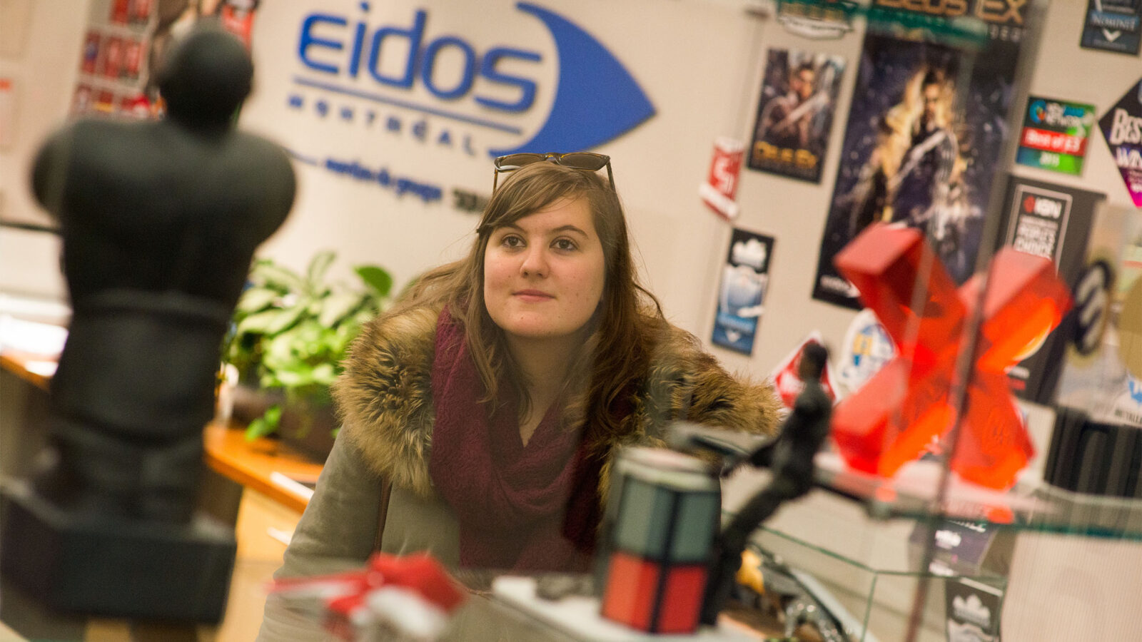 game student exploring the eidos headquarters in montreal, canada