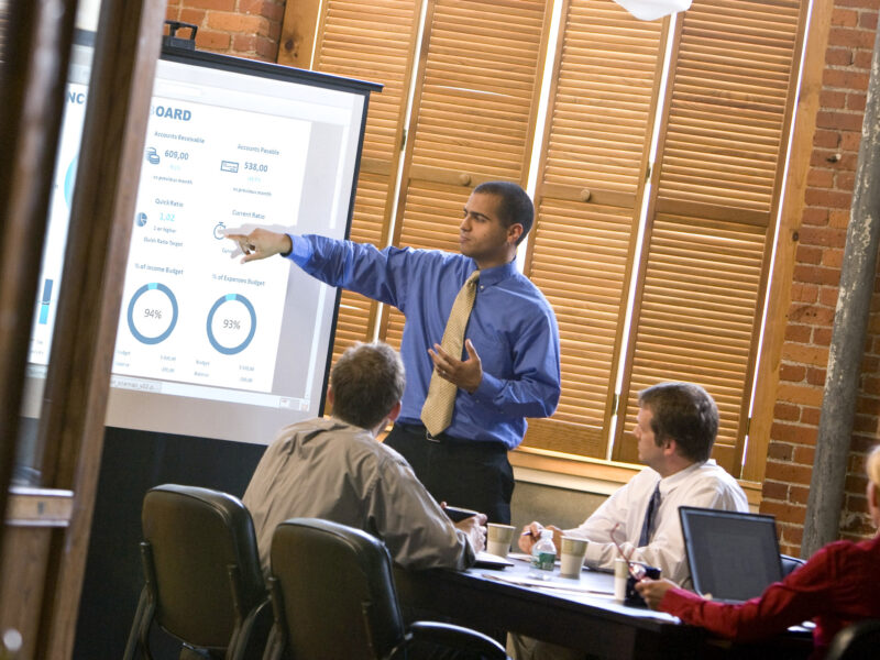 business man presenting data to colleagues