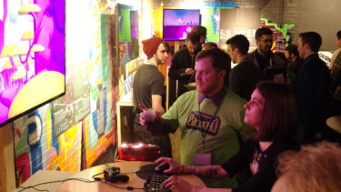 game enthusiasts try new games at the senior game show