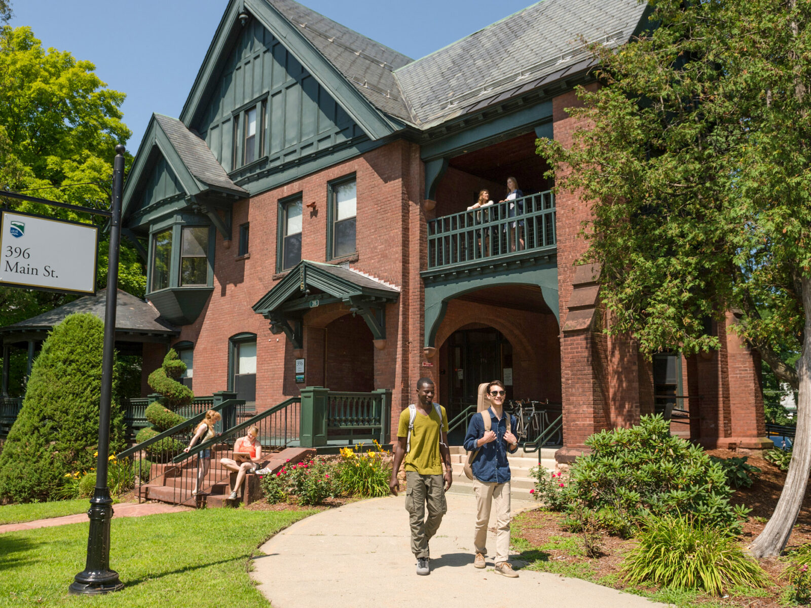 students enjoy a sunny day at 396 Main street residence hall