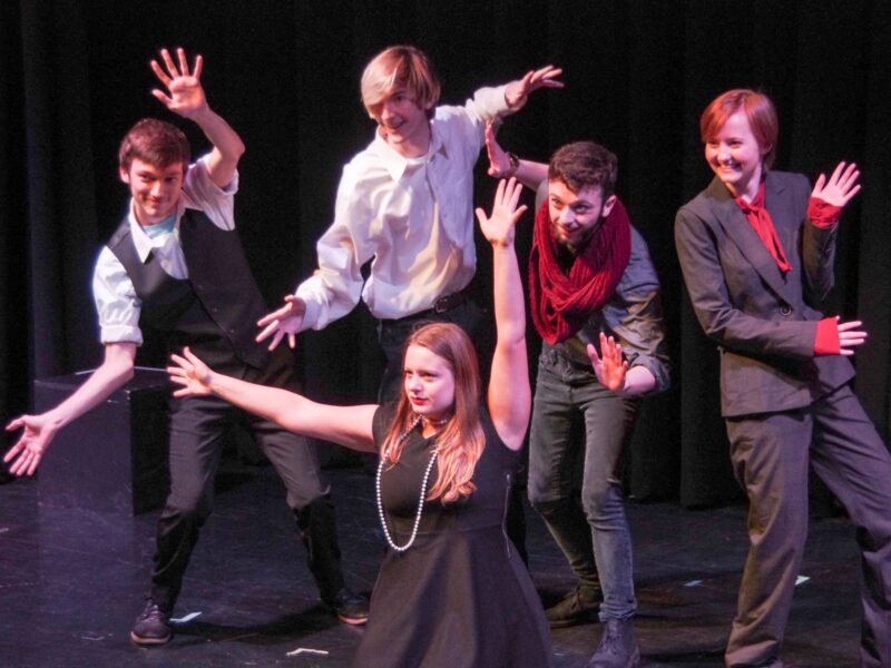 Students in the Champlayers club preforming on stage