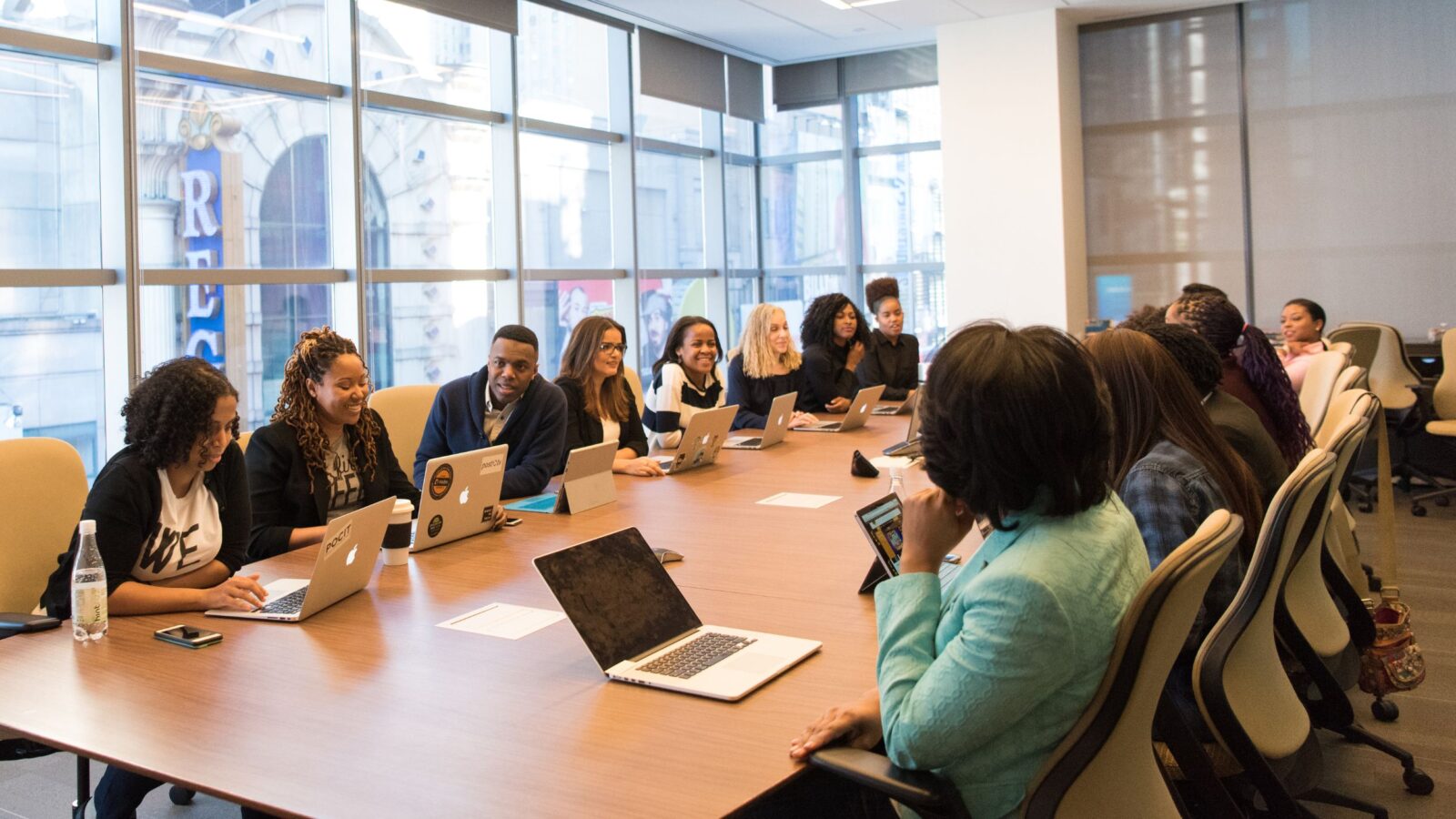 stock photo of a group of staff members in a conference room