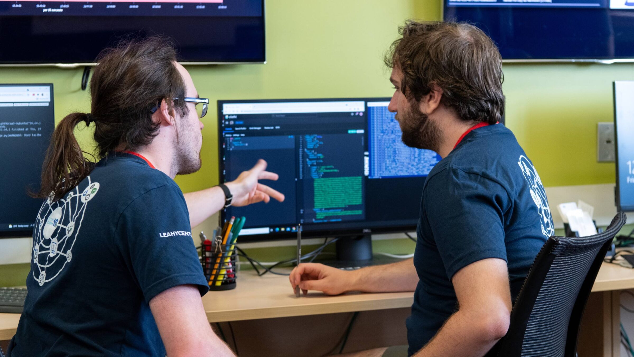 Two students working on a computer