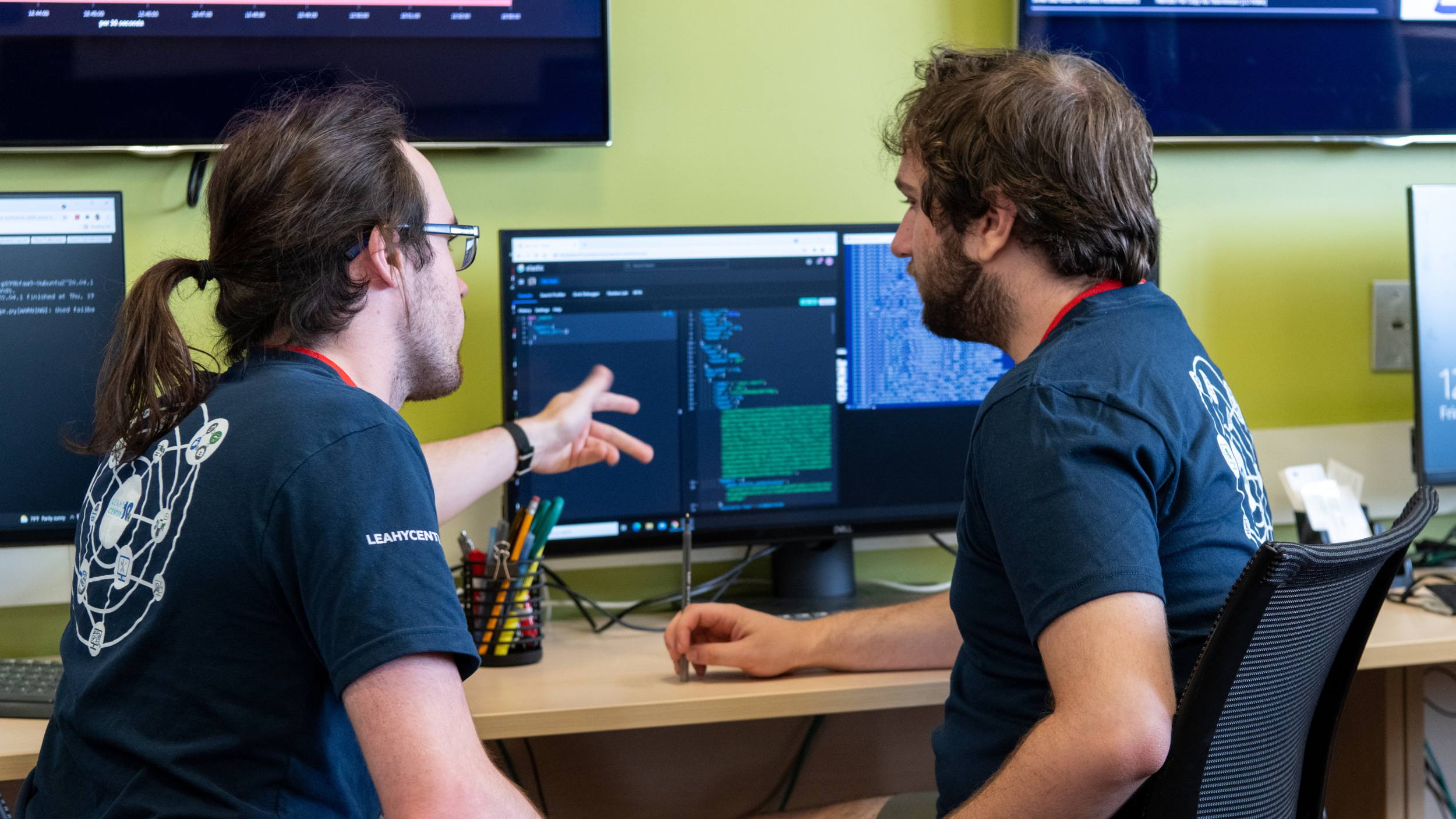 Two students working on a computer