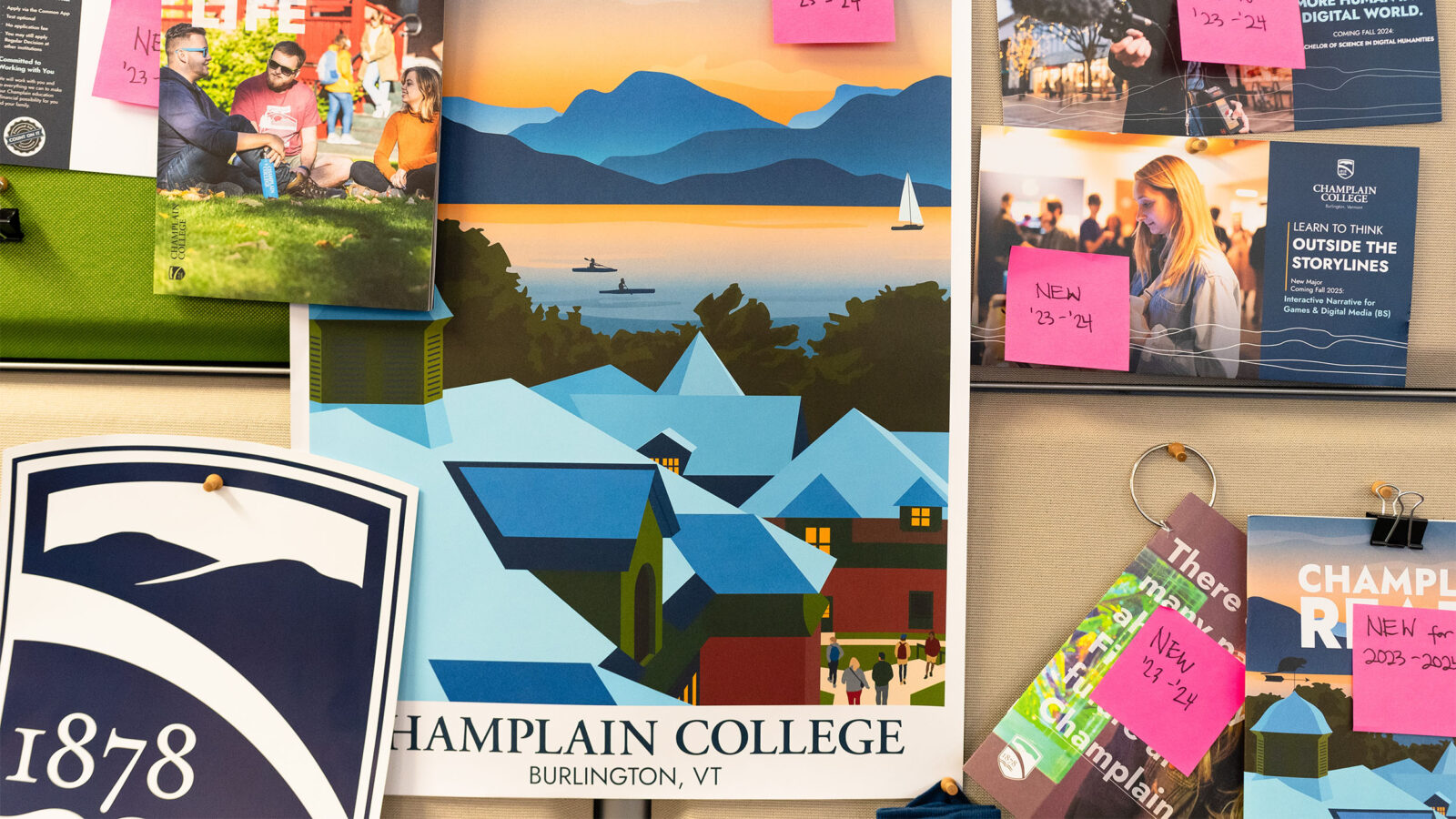 various champlain college marketing materials pinned to the wall