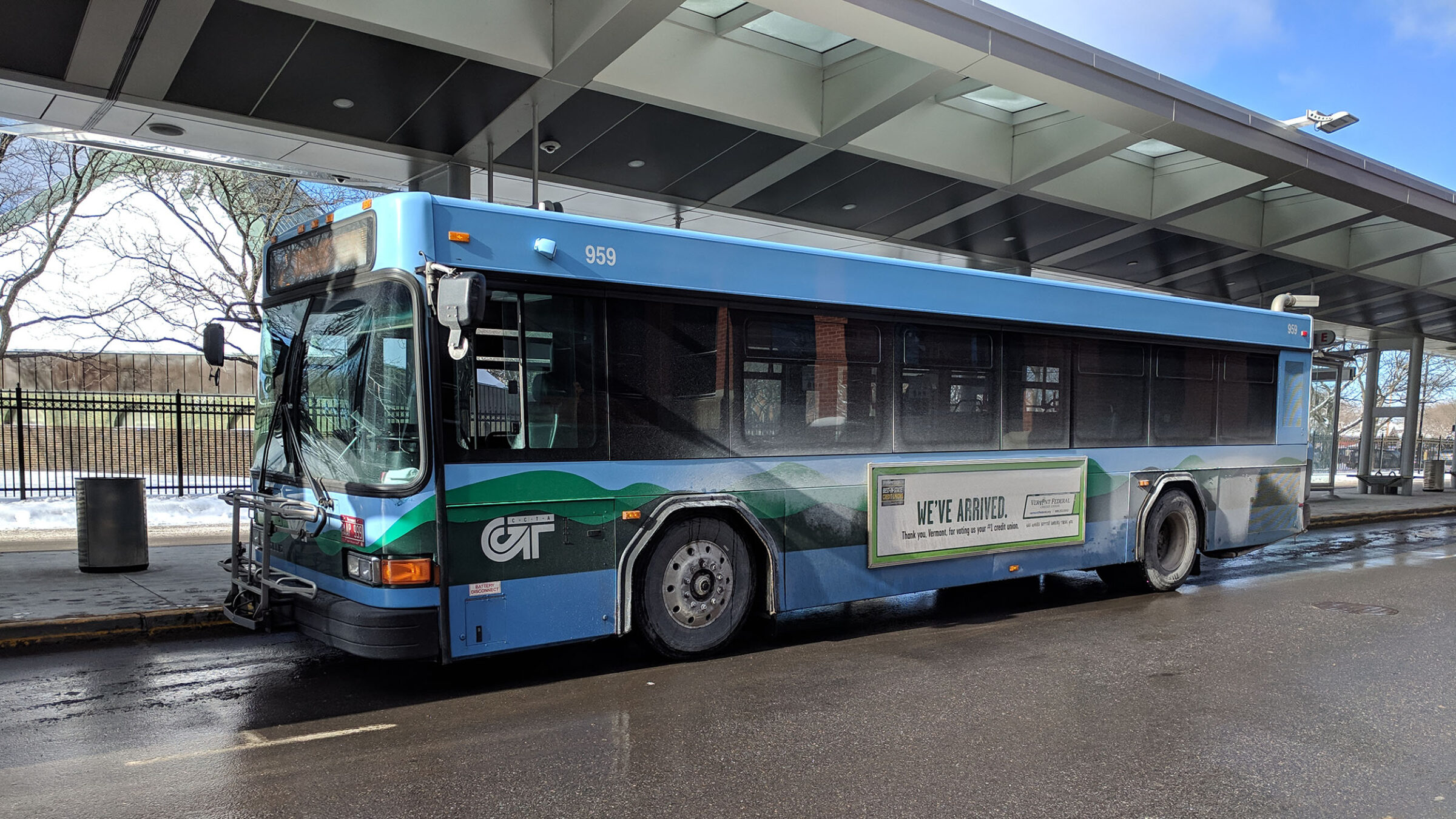 a green mountain transit bus parked at the burlington bus station