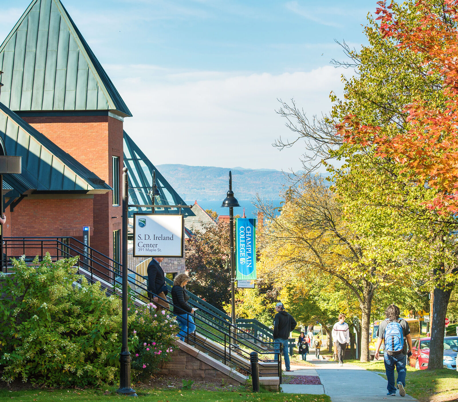 Champlain campus buildings along Maple Street in the fall