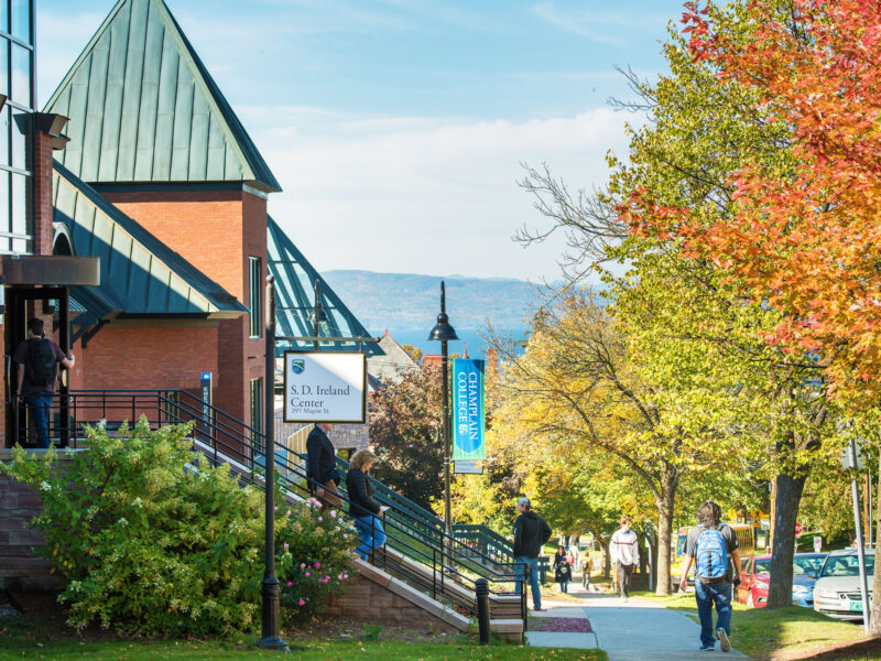 Champlain campus buildings along Maple Street in the fall