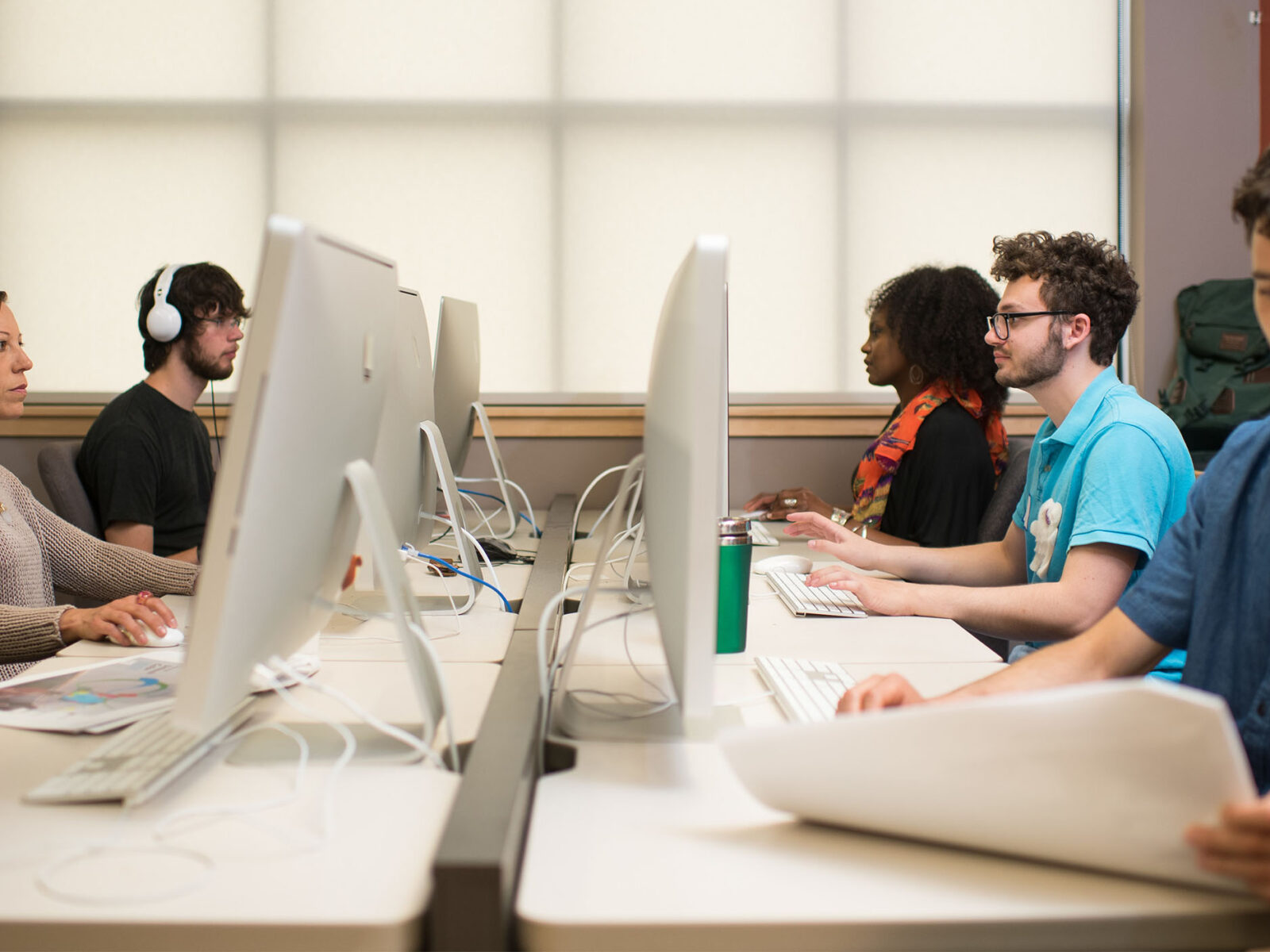 students individually working on mac computers in a ccm computer lab