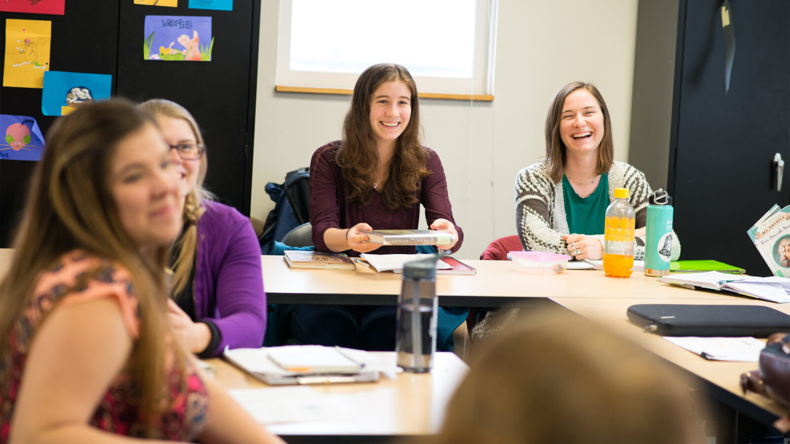 Students laughing in a classroom