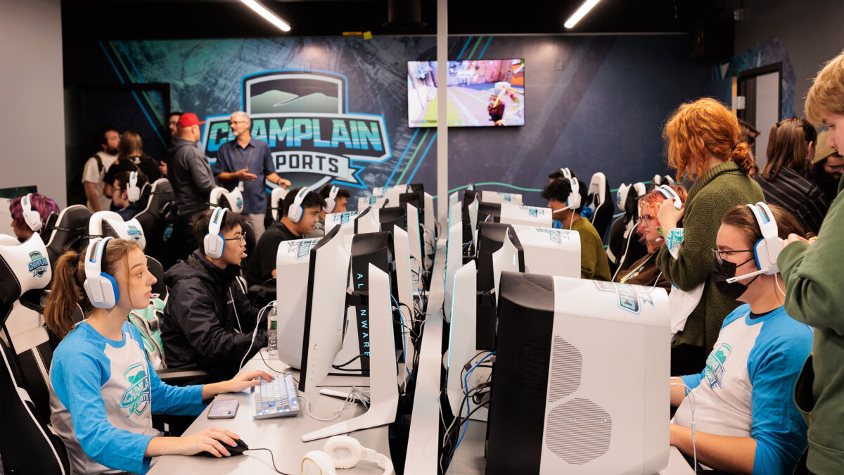Many students competing on computers in the esports arena