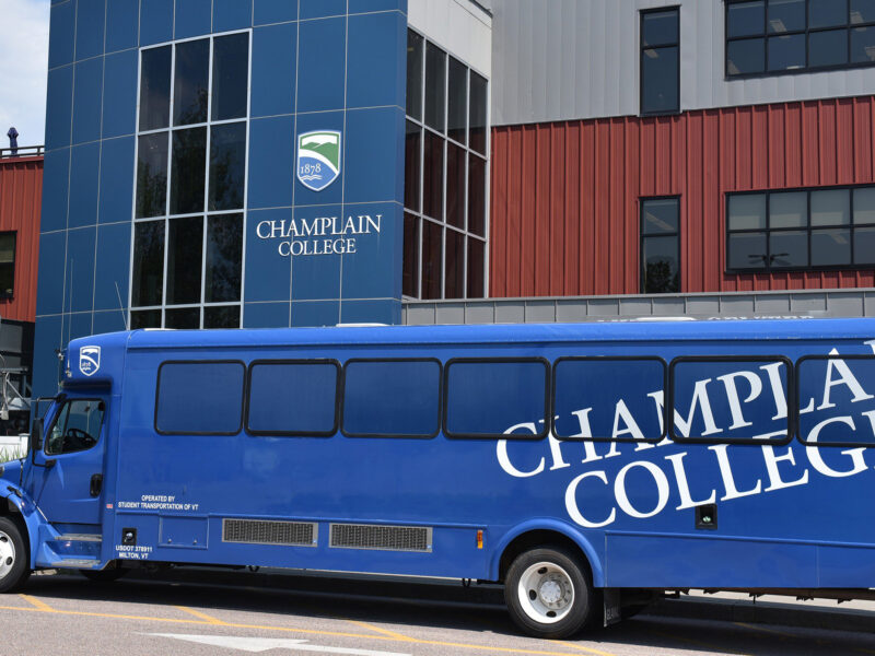 Champlain College bus in front of Miller Center