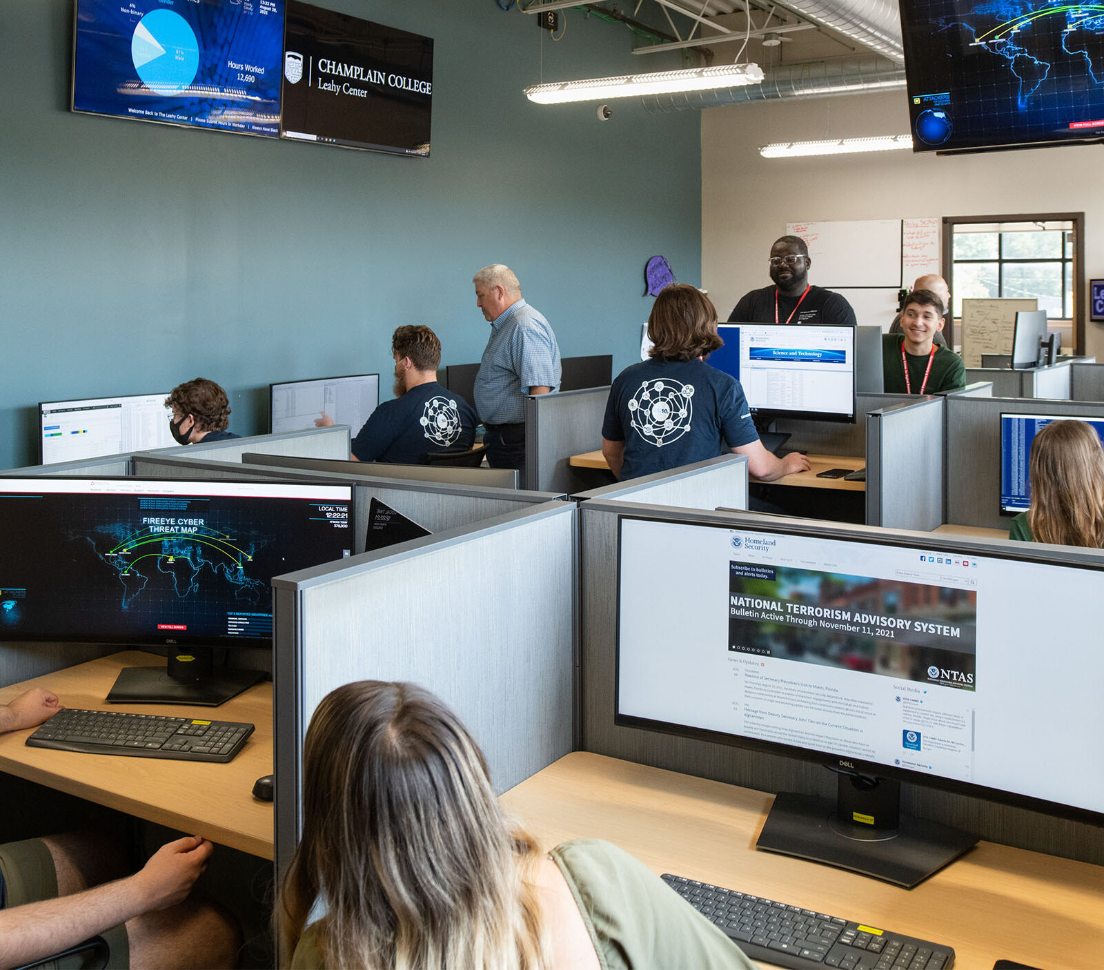 cybersecurity & digital forensics students collaborating in the leahy center