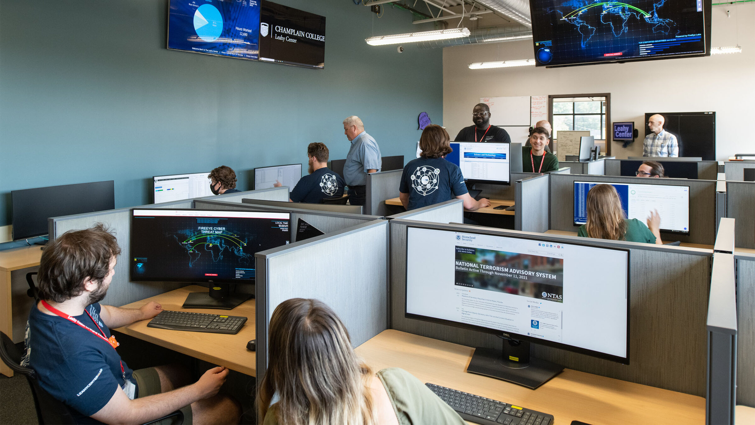 cybersecurity & digital forensics students collaborating in the leahy center