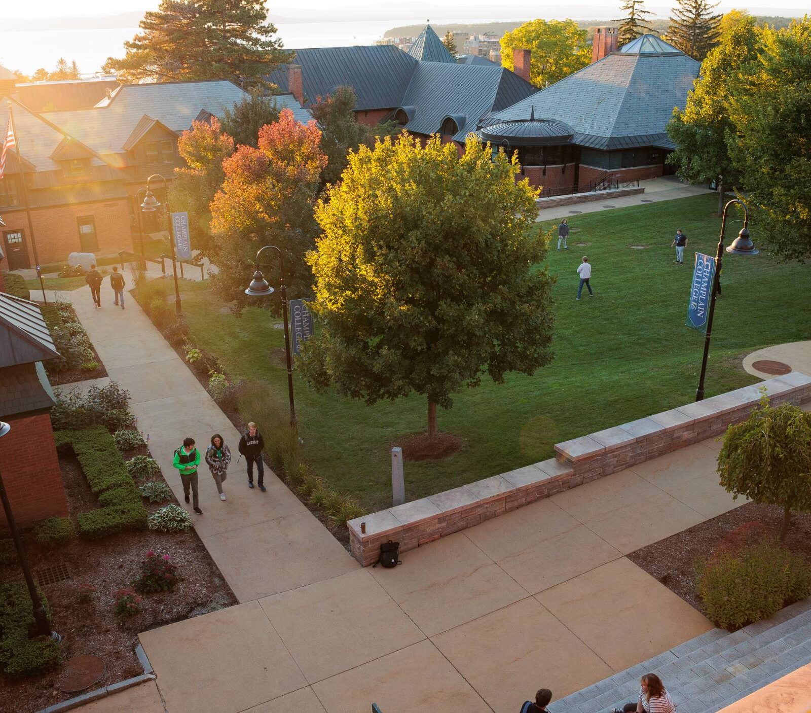 Aerial sunny photo from the library of campus with students walking around