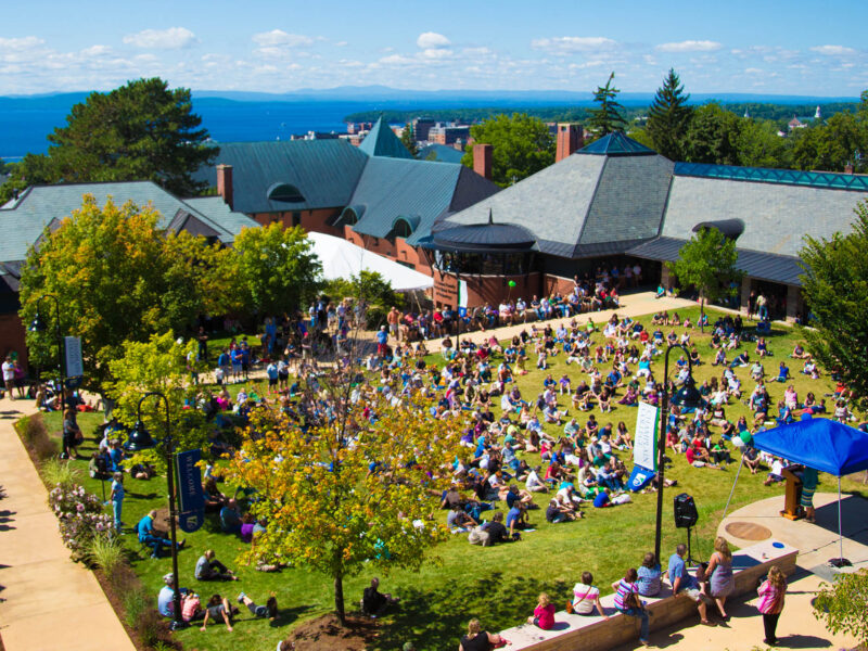 hundreds of students gather on the green for orientation