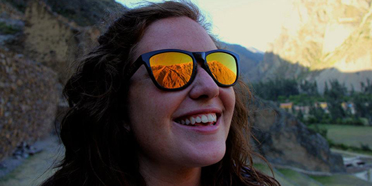 A closeup smiling photo of Sarah Ramsey, a business student who unfortunately passed away, that we now have a scholarship in the honor of.