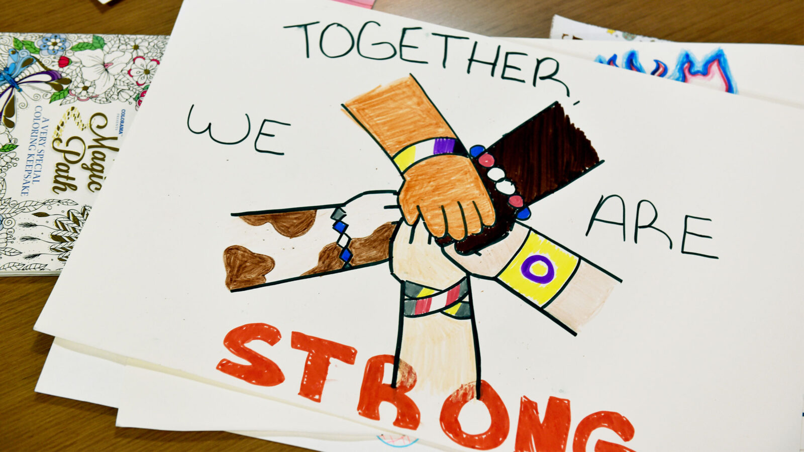 sign that reads "together we are strong"