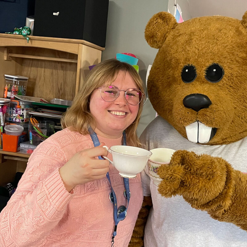 julia blanding cheers a cup of tea with chauncey