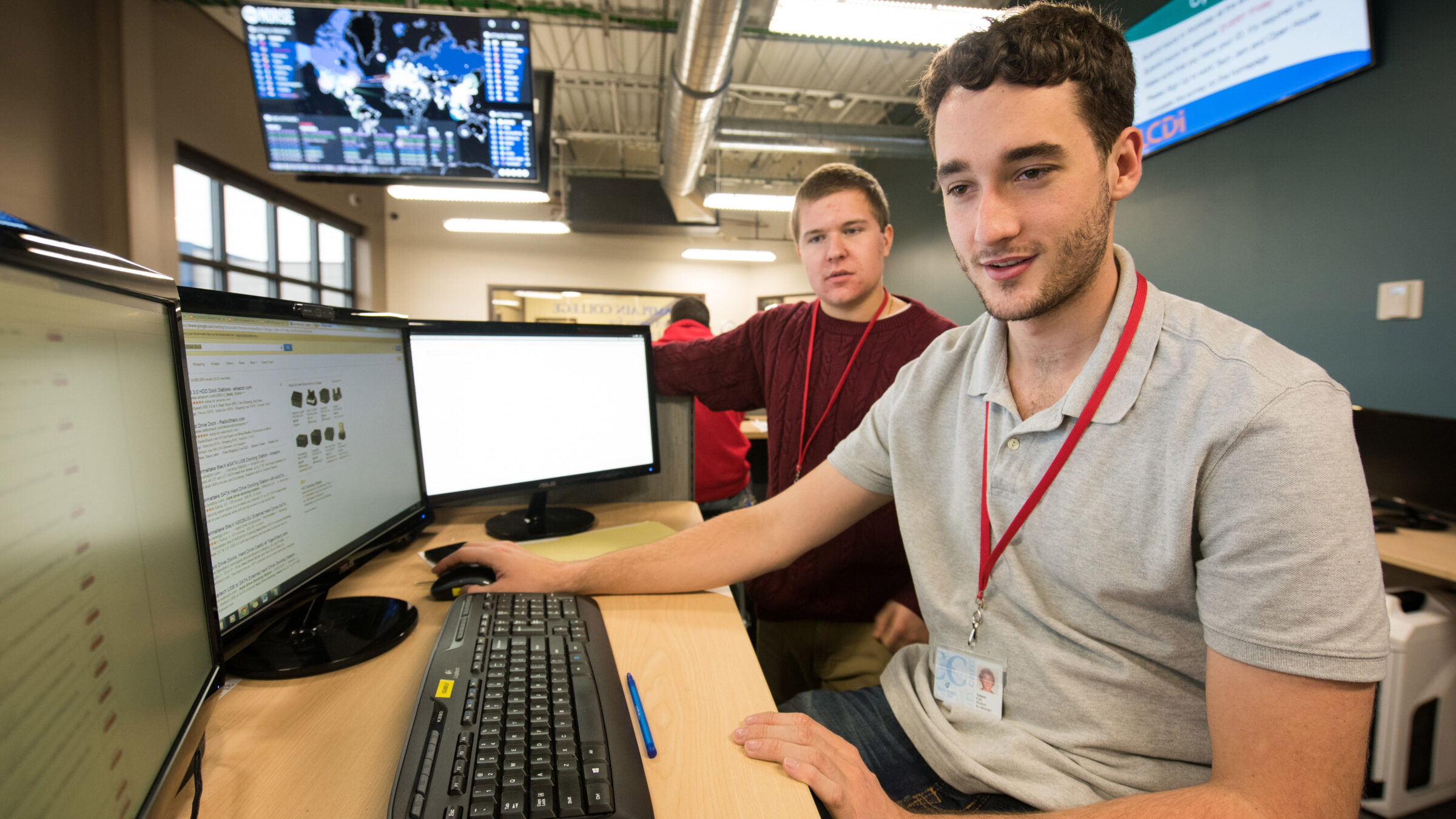 students at Leahy Center work on am IT problem