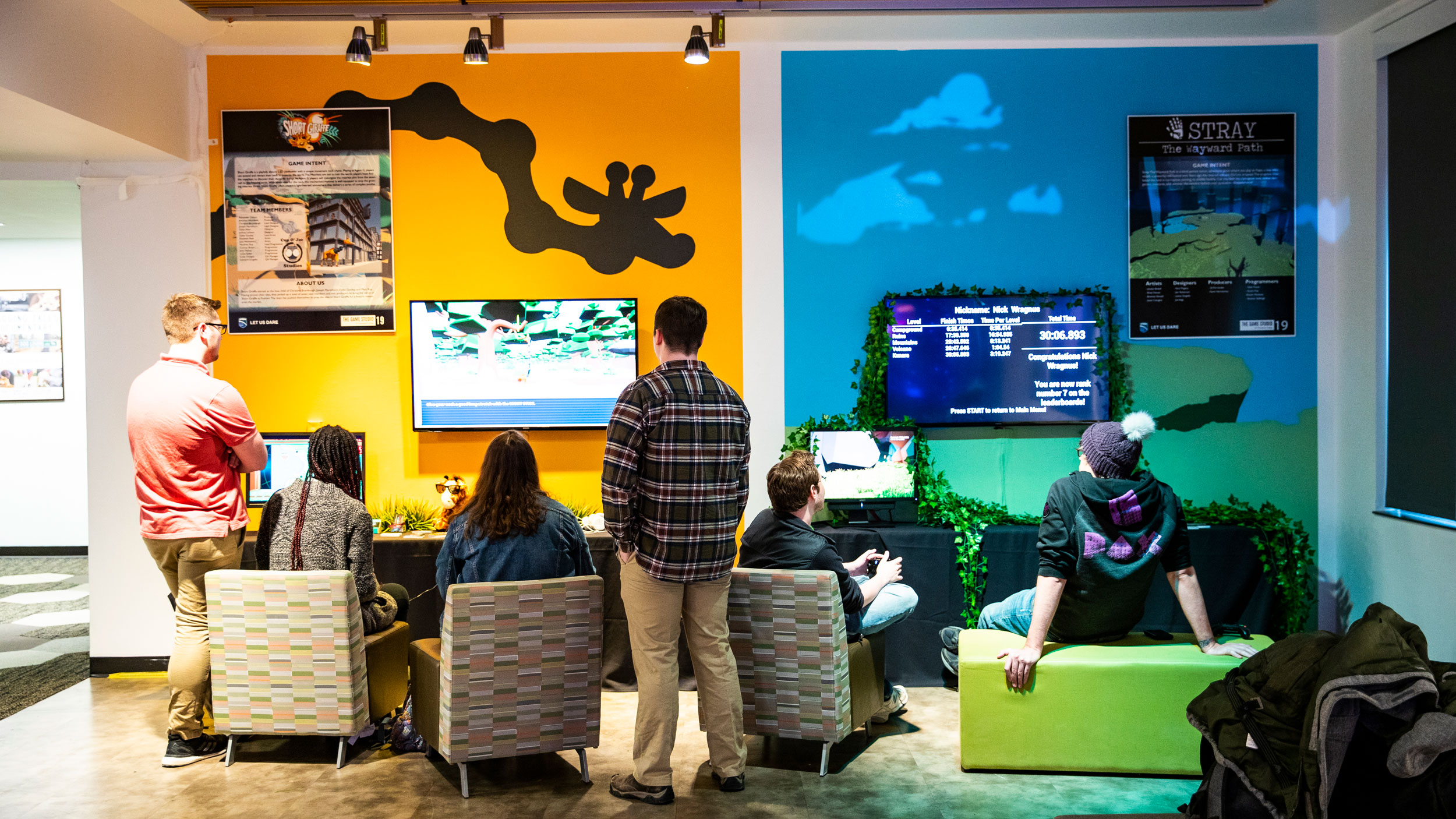 Students demo a video game display at Champlain College