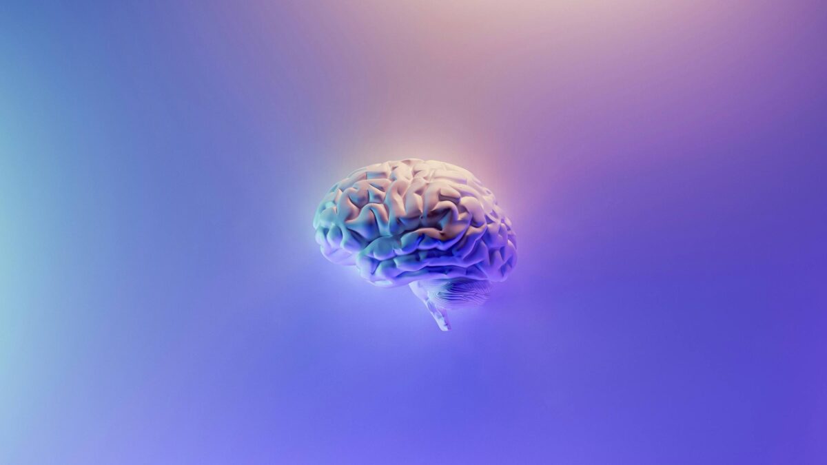 stock image of a brain on a blue and purple background