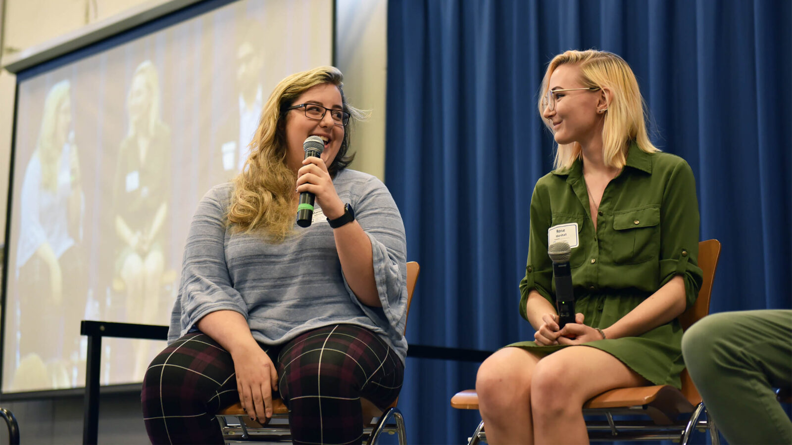 Students chat on stage at Sophomore Summit