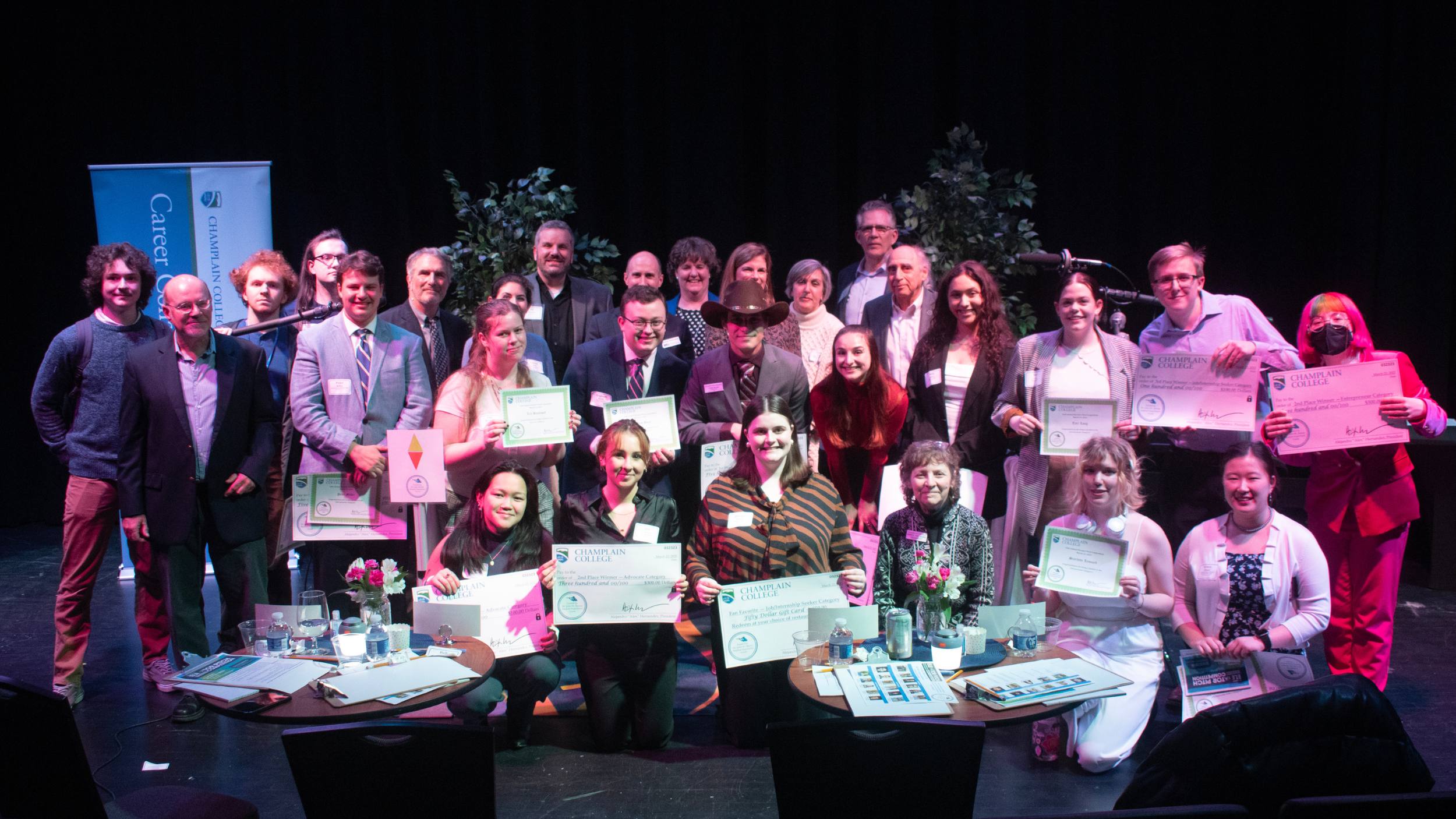 a group of elevator pitch students on stage