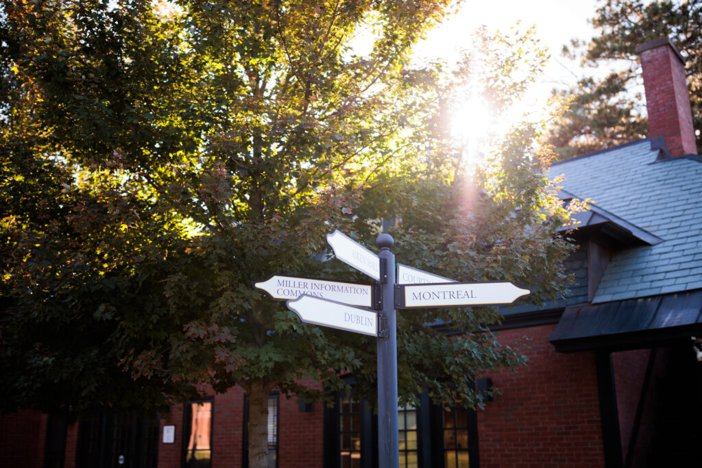 Directional sign at Champlain College pointing out different buildings and campus locations.