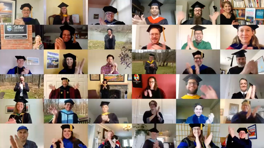 a screenshot of faculty celebrating a virtual commencement celebration