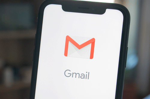 a phone screen with the gmail logo