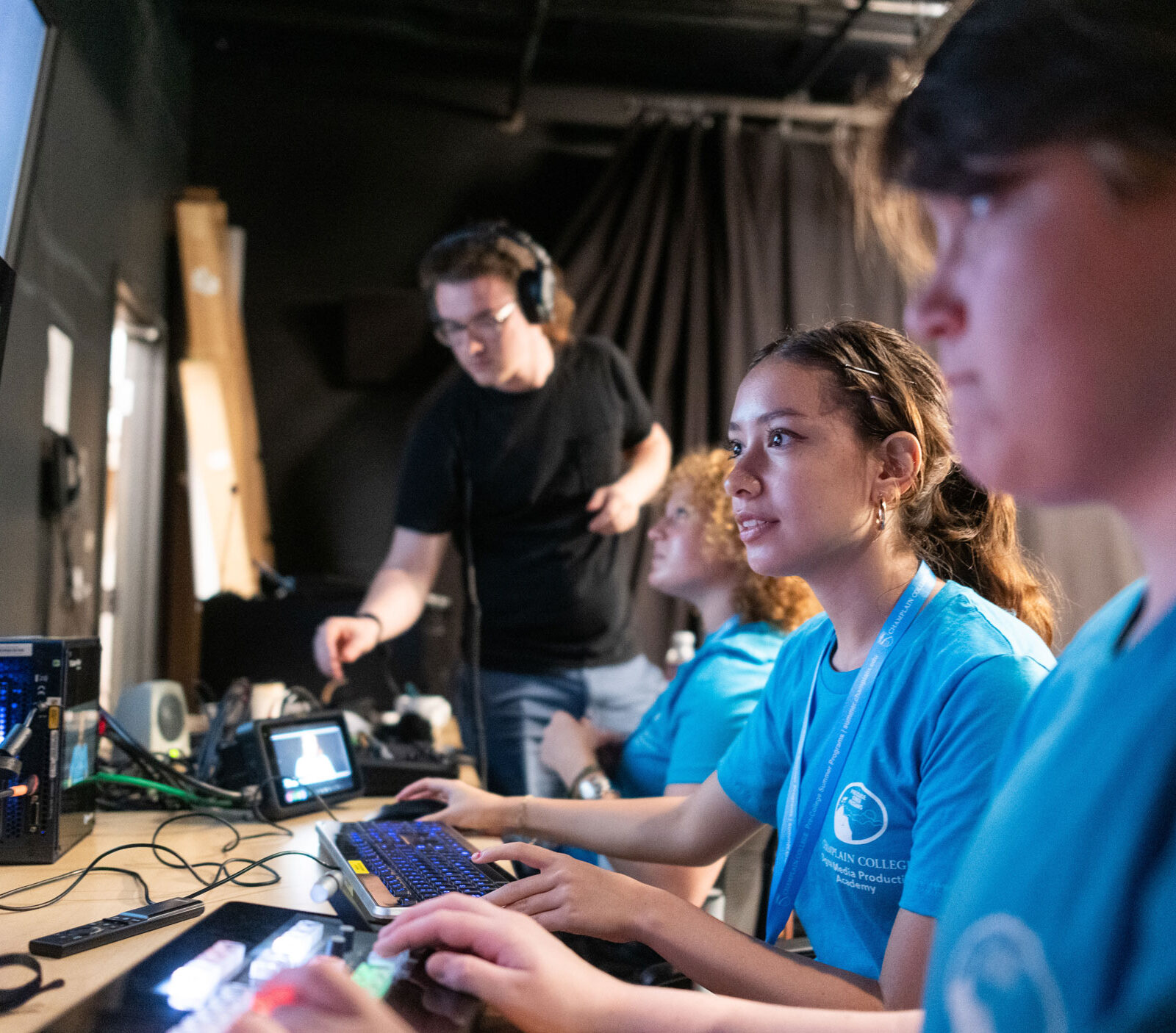 High school students edit video footage at a Champlain College Pre-College Summer program.