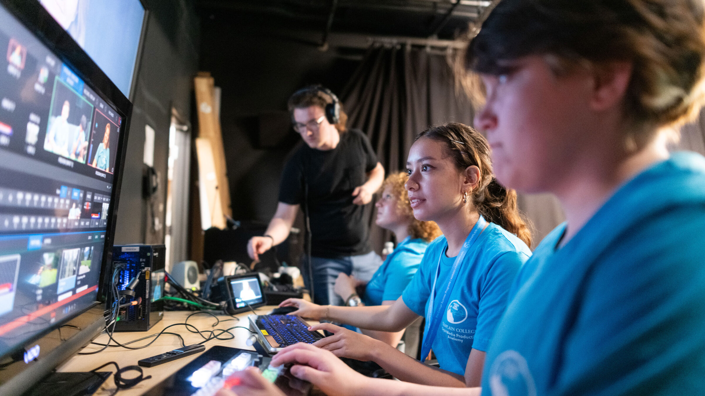 High school students edit video footage at a Champlain College Pre-College Summer program.