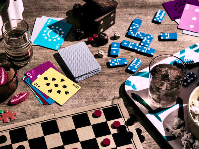 board games and popcorn dispersed along a wooden table