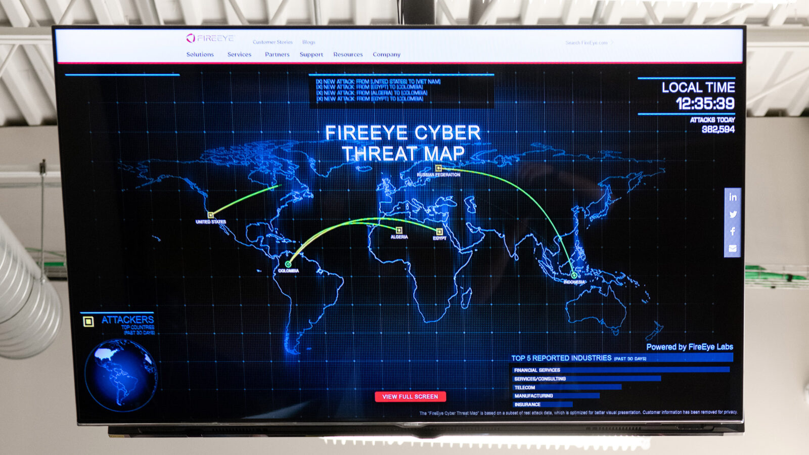 Leahy Center cybersecurity monitor showing the Fireeye cyber threat map of the world