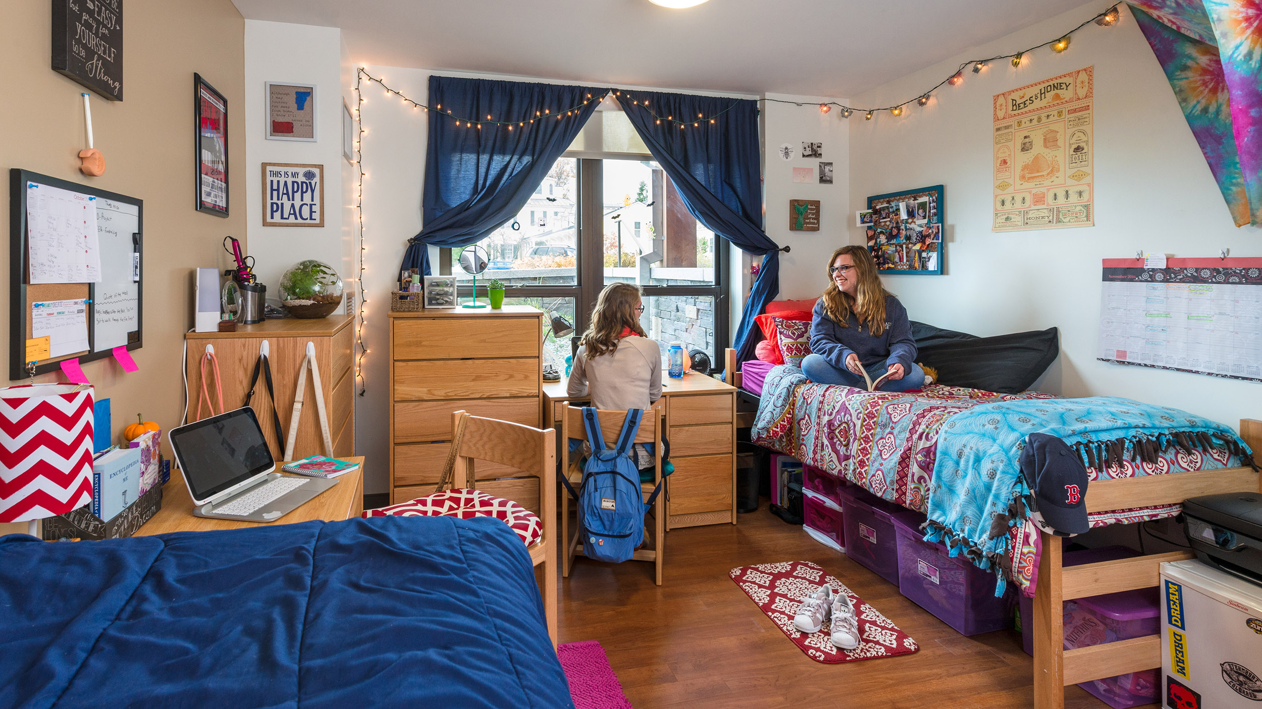 students in a decorated dorm room